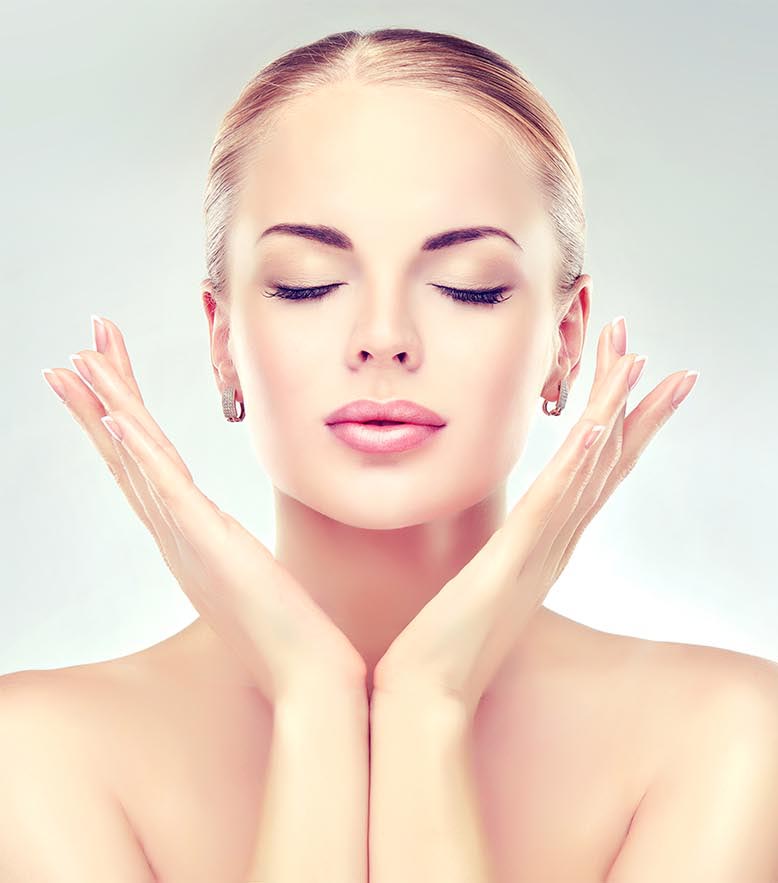 Woman showing skin rejuvenating results of microcurrent treatments